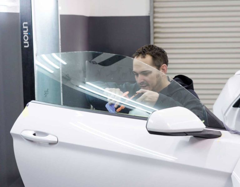 Removing car window tint in Portola Valley